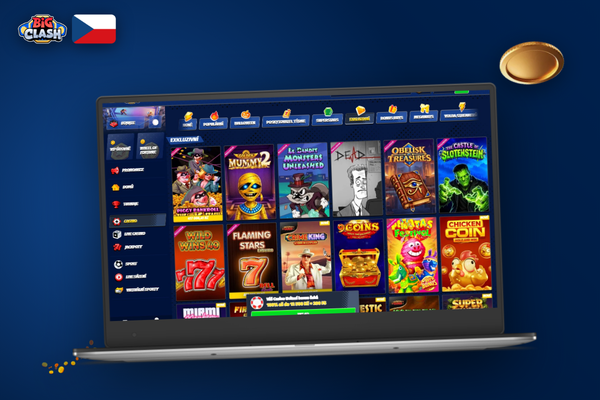 Hráč u stolního počítače s velkým monitorem a rozhraním Bigclash Casino na PC